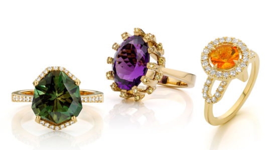 Handmade gold rings with precious stones.