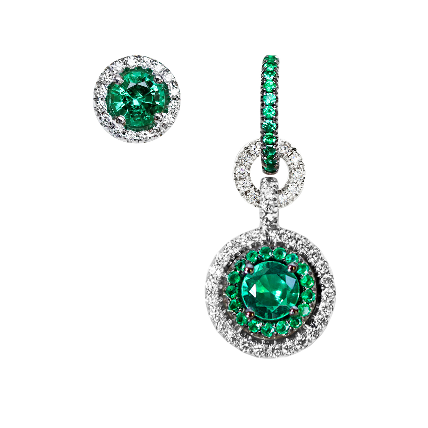 A pair of mismatched earrings with intense green Colombian emeralds and diamonds that can transform into a pendant with a pair of shorter earrings.