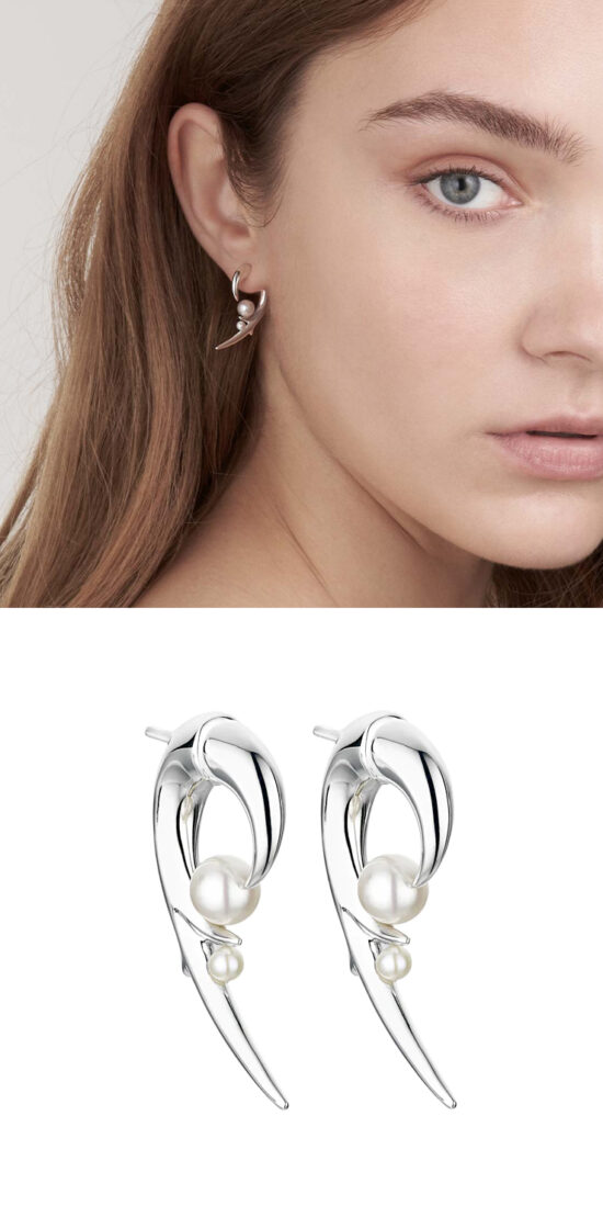 Double-sided silver earrings with freshwater pearls.